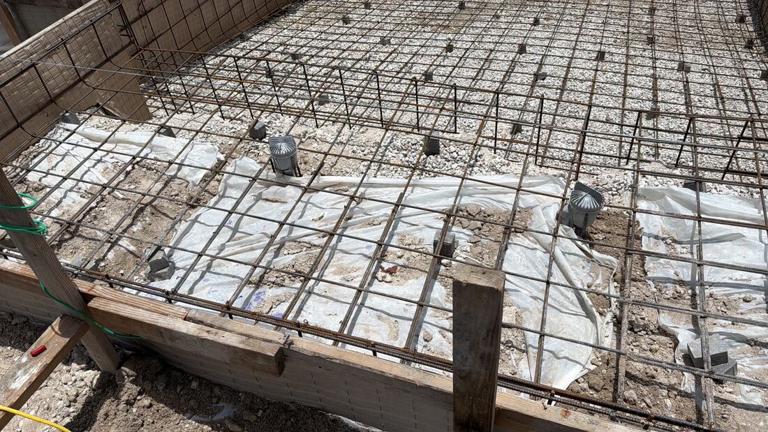 Steel reinforcement and plumbing